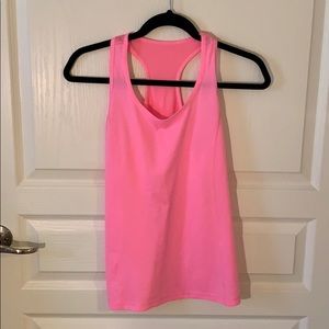 Pink workout tank. Semi fitted